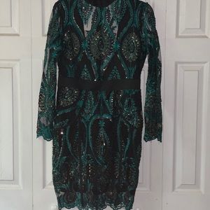 Lace and shimmer green and black dress